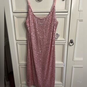 Cute sequence pink mini bodycon dress. Fits perfectly!